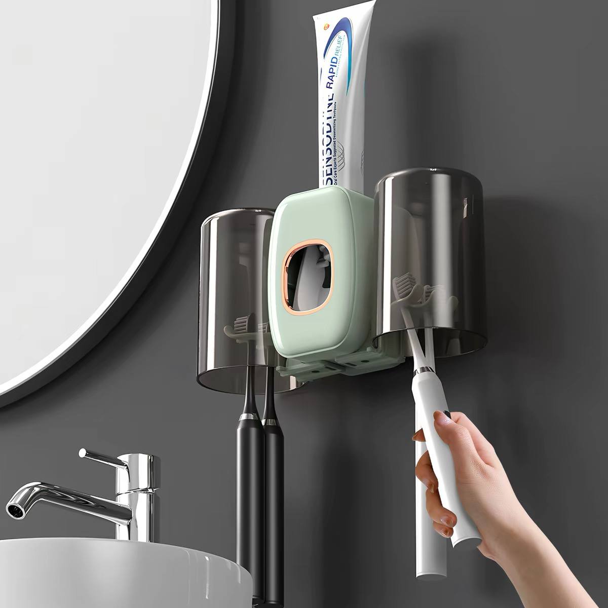 Toothpaste dispenser and toothbrush holder set