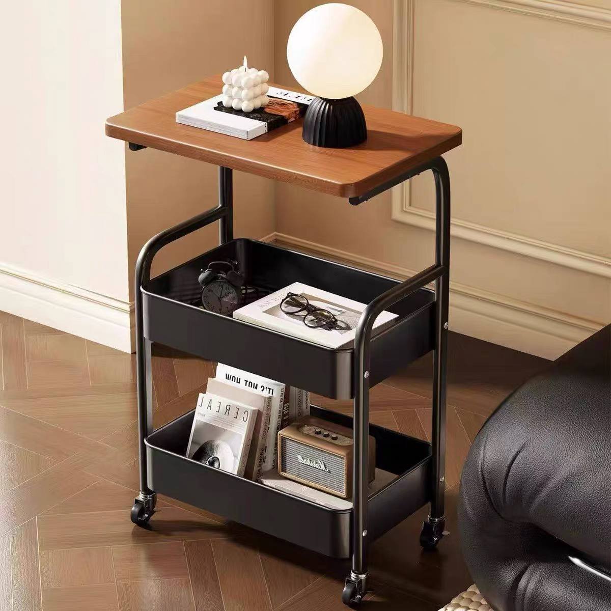 3-tier black metal storage cart.