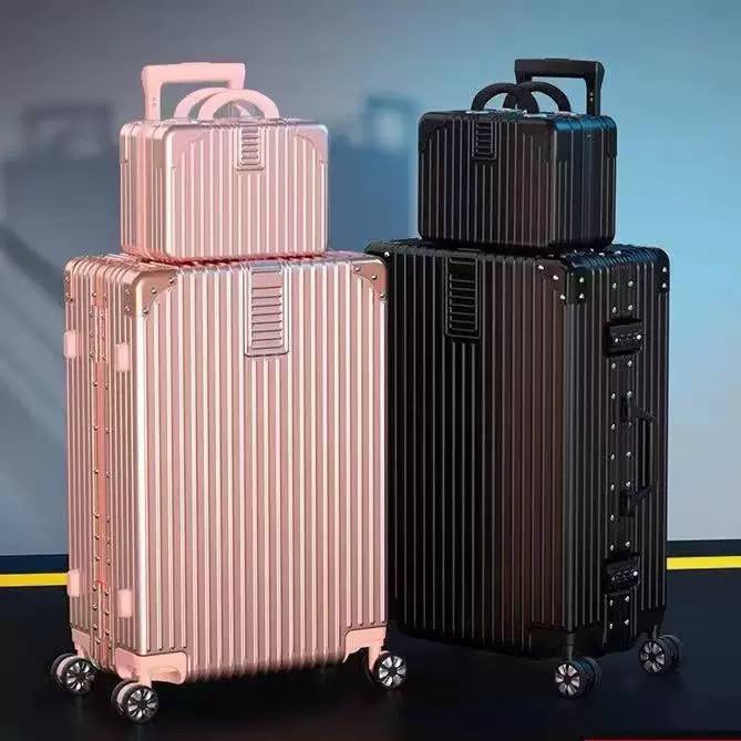 Modern, vertical-ribbed suitcases with matching carry-on cases image 4